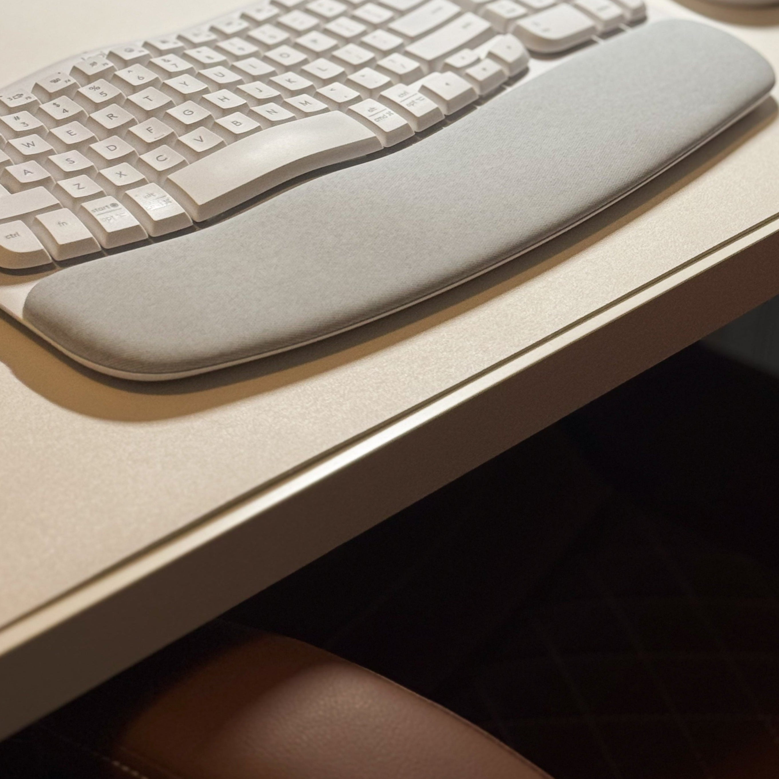 Keyboard and mouse on a desk with a focus on ergonomics